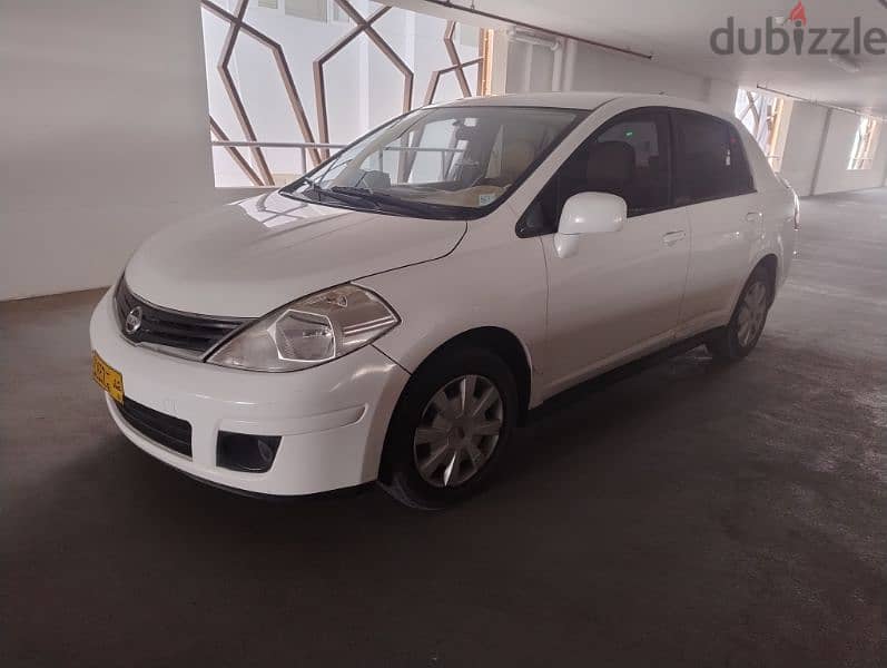 expat leaving well maintained Nissan Tiida 2012 for sale in Azaiba 12