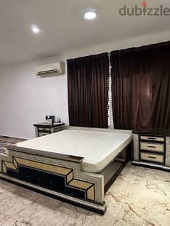 Bed king sizewith mattress, side tables and dresser, 50 riyals