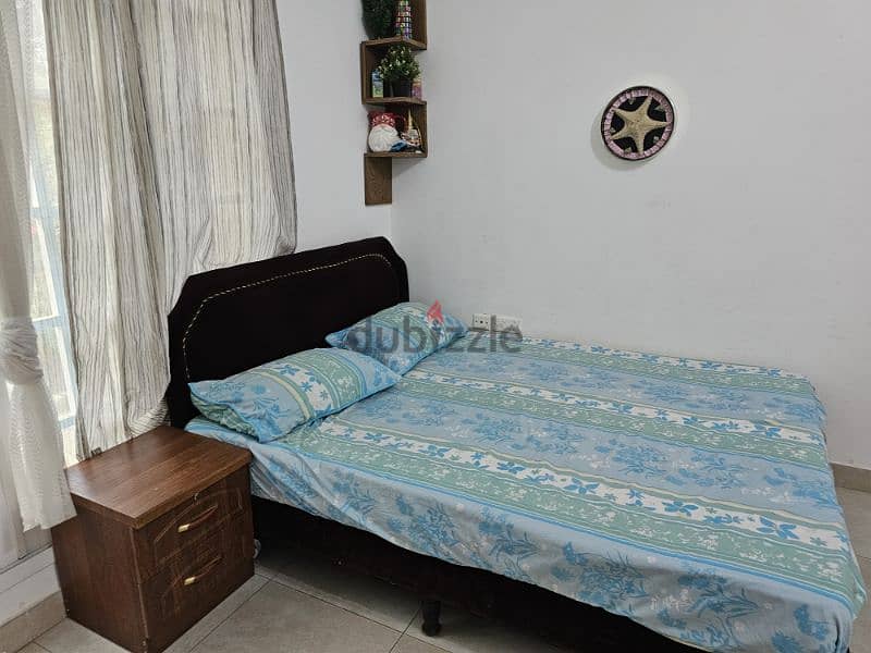 good condition bed, mattress and side table 1