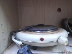 جهاز طبخ كهربائي ومسخن للطعام  / electronic cooker and food heater