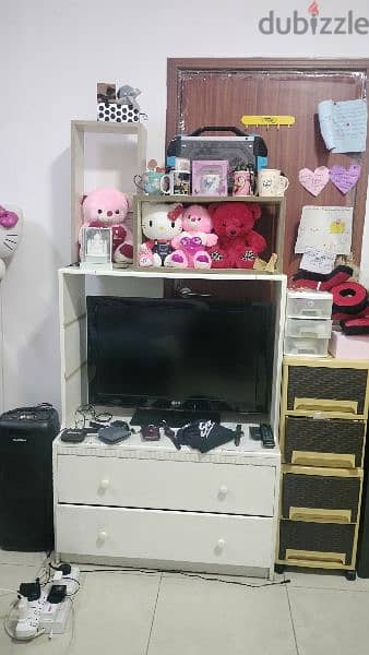 with TV stand and Speaker, under drawers 0