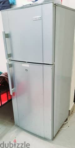 medium size fridge 2 door very nice condition