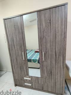 Big 3 door wardrobe/cupboard with full length mirror