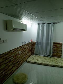Room attached bathroom and kitchen for rent in ghubra 94254177