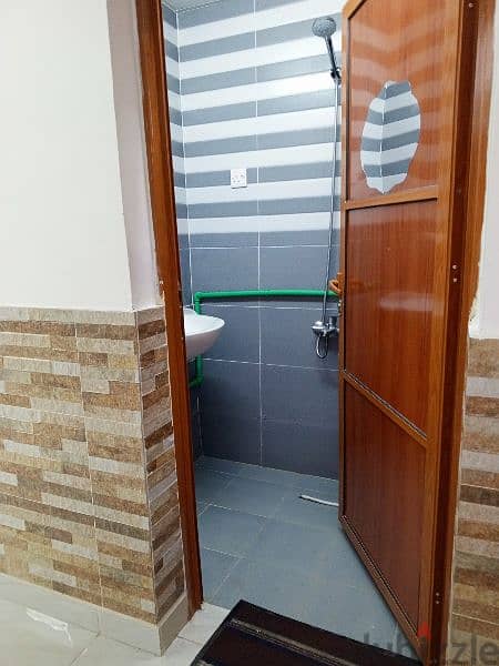 Room attached bathroom and kitchen for rent in ghubra 94254177 3