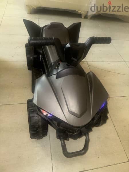 kids electric atv good in condition comes with charger 0