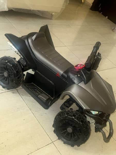 kids electric atv good in condition comes with charger 1