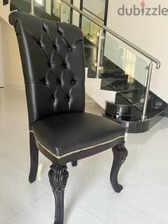 two black dinnig chair