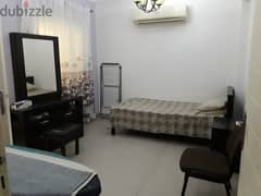 Room in 2BHK apartment in Ruwi  with separate wash room