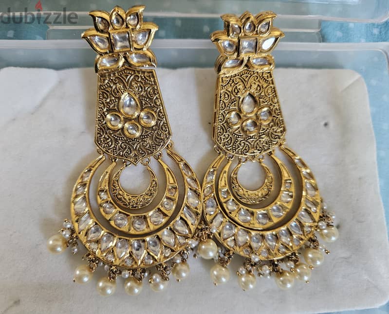 Artifical Earring with American zircon and polli 0