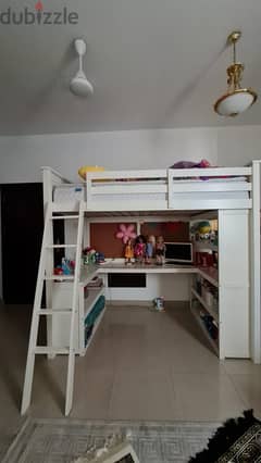 Bunk bed with attached study table at the bottom + mattress