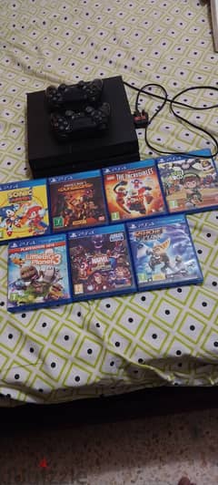 PS4 with 2 controller for sale with free CD's