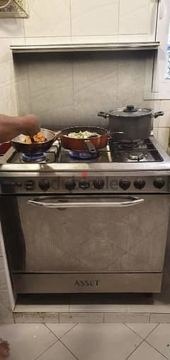 cooking range, gas cylinder, microwave