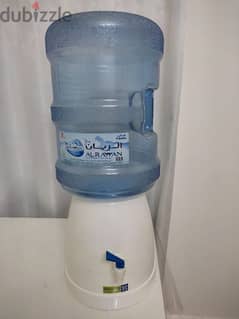 Portable water dispenser and bottle