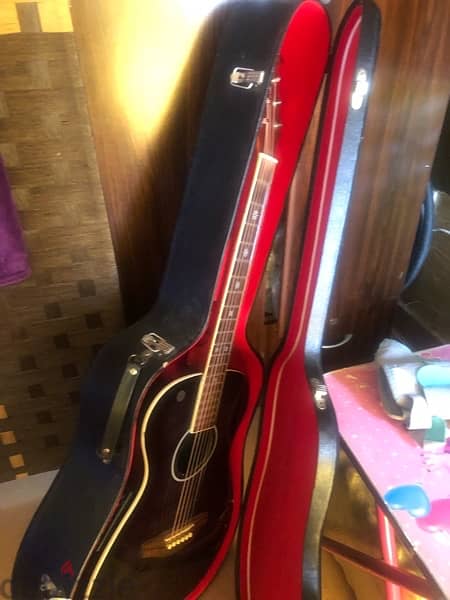 hard case guitar for sale 40 omr with free guitar 3