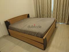 Bed with storage unit and mattress