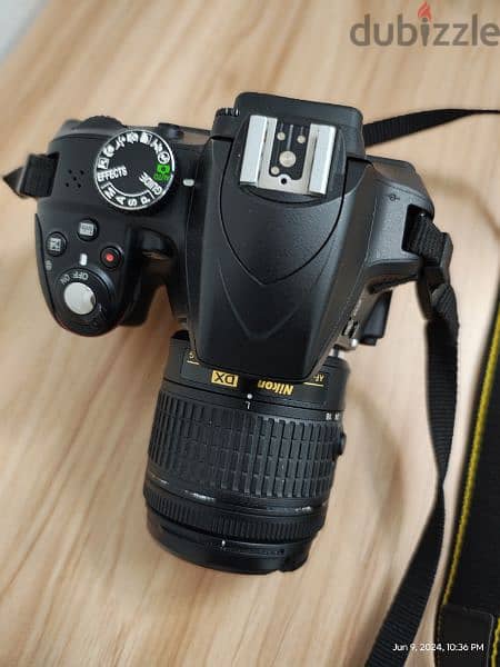 Neat and Clean Nikon DSLR D3300 Camera and a new tripod 2