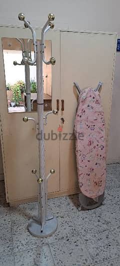 Two door cupbord, ironing stand and clothes hanger