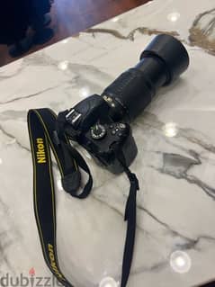 camera nikon 3200D with 2 lans battery charger memory