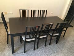 Extendable table with 8 chairs