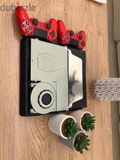 PlayStation 4 with 2 controllers