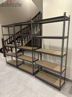 3 steel storage units with durable boards shelves