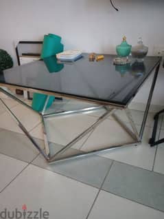 Pan glass coffee table