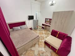 A fully furnished studio consisting of a bedroom, bathroom a kitchen