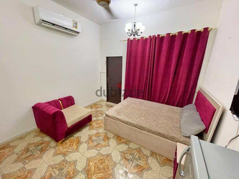 A fully furnished studio consisting of a bedroom, bathroom a kitchen 2