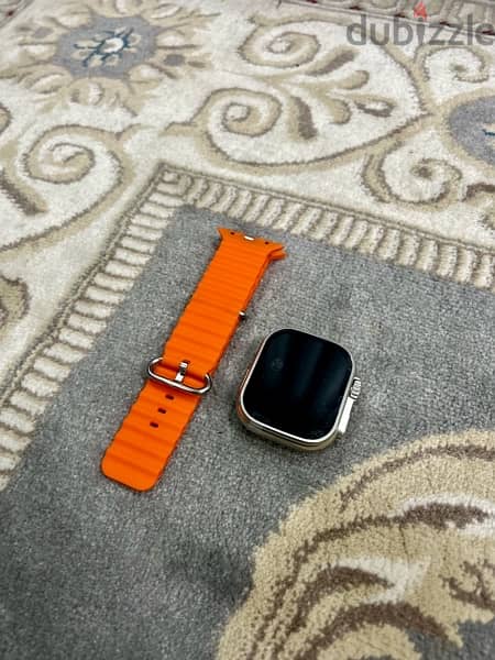 a new watch with earbuds and power bank in great condition 3