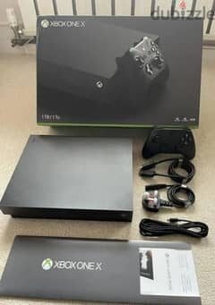 Xbox one x one terabyte with controller  and some downloaded games