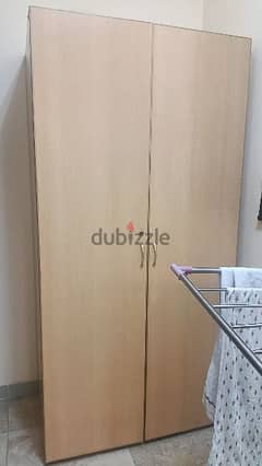 Double bed with mattress and wardrobe