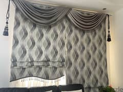 Roman-style curtains in very good condition.