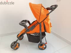 Orange color stroller 0