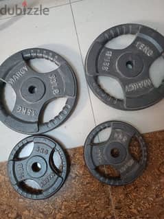 Barbell rod, 2 15kgkg weight, 4 5kg weight, 2 dumbells with 10kg