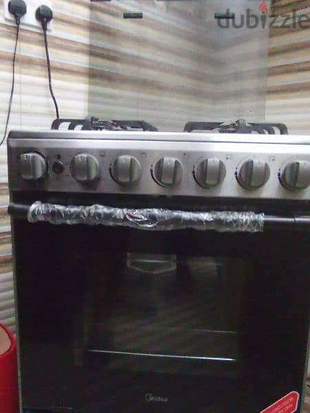 Midea Cooking range and gas cylinder 9