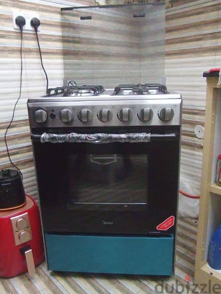 Midea Cooking range and gas cylinder 15