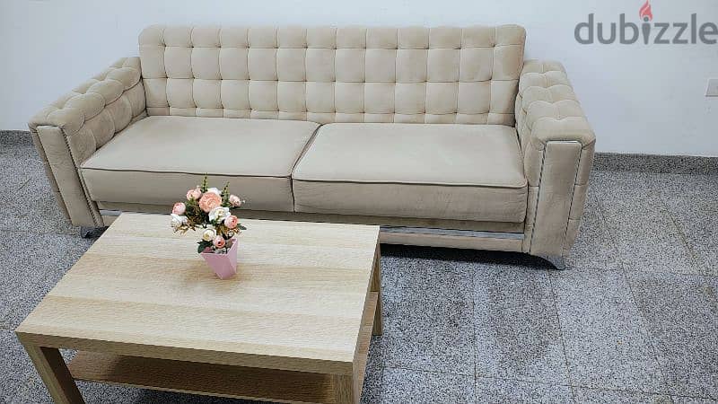 Sofa bed with Storage and a coffee table for sale 10