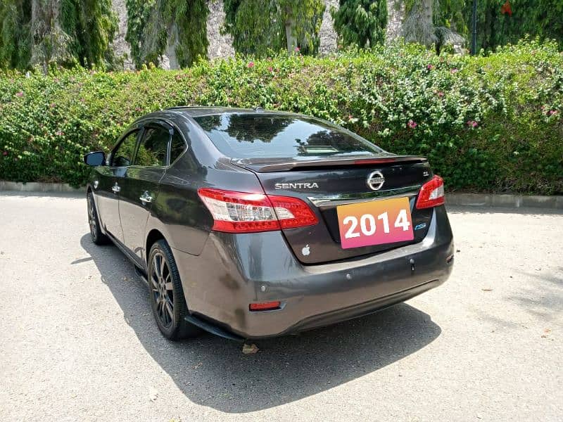 No. 1 Full options Nissan Sentra 2014 (Only 94,000 done) 1