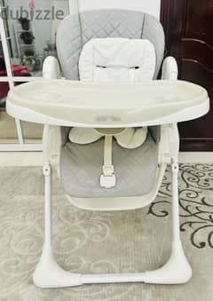 High chair available for sale 0