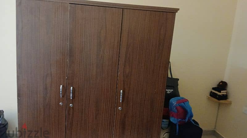good condition bed and cupboard for sale only 50 rial 2