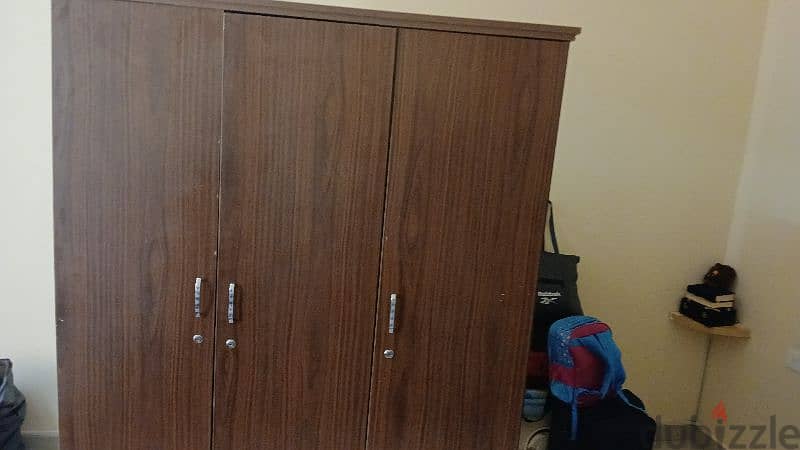 good condition bed and cupboard for sale only 50 rial 0