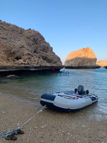 قارب مطاطي مع المكينة والترولي inflatable boat 3