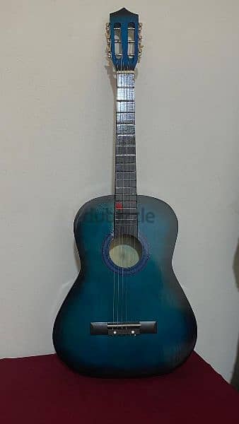 medium size acoustic guitar in blue color 4