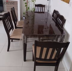 Dining table + 6 chairs available for sale