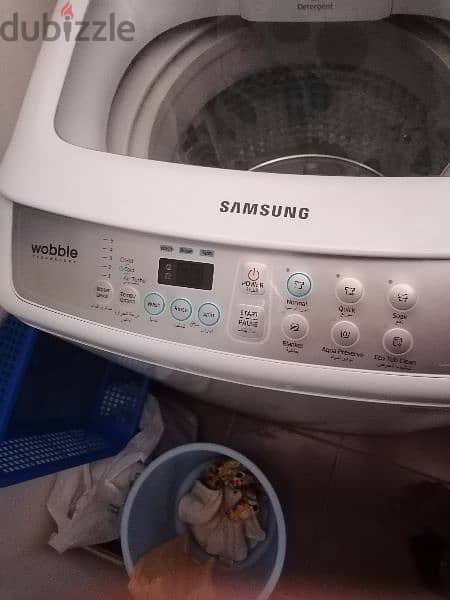 7 liter washing machine looking like new RO. 65.000 0
