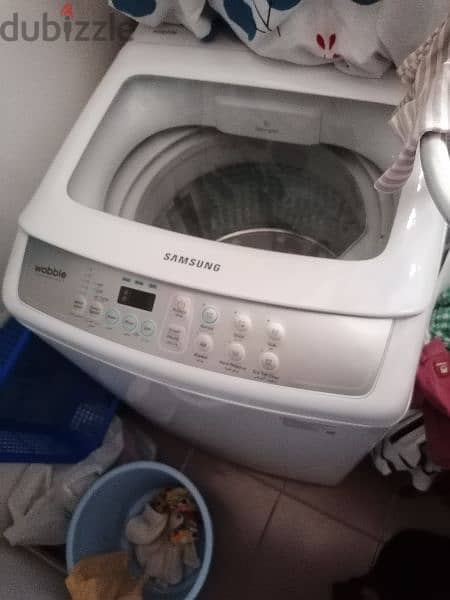 7 liter washing machine looking like new RO. 65.000 1