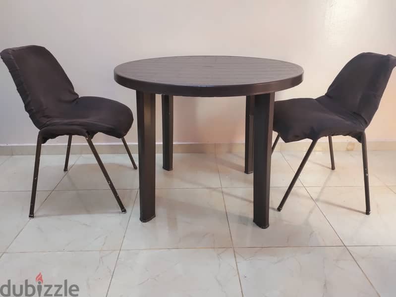 Round table (Diameter-90 cm) with 2 cushioned chairs-Brown Colour 1