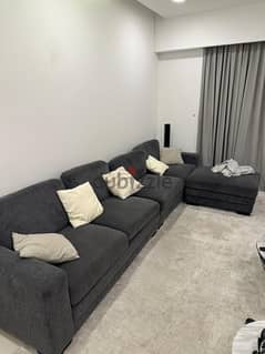 L Shape Dark grey sofa in Excellent condition