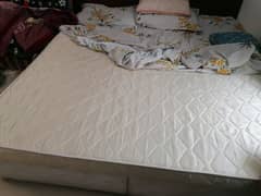 King size bed ( 1 year old looking like new) with box type coat.
